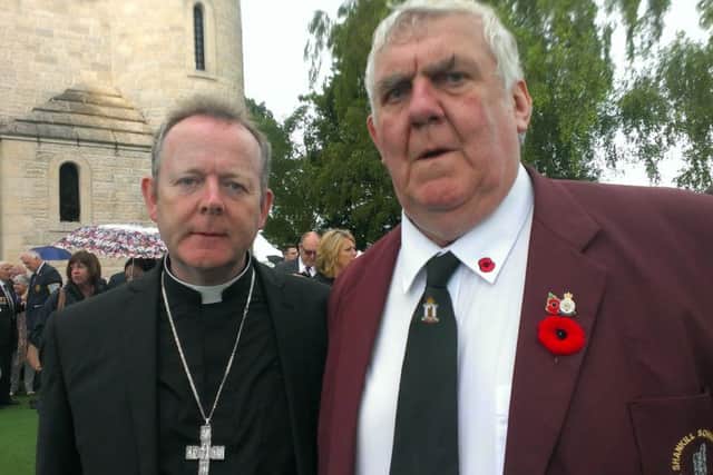 Archbishop Eamon Martin and Ernie Black at the Ulster Memorial Tower, Thiepval. By Ben Lowry