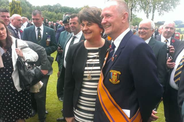 Arlene Foster poses for picture with a wellwisher at the Ulster Memorial Tower, Thiepval. By Ben Lowry