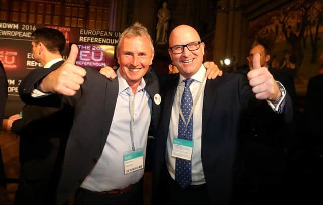 Conservative MP Nigel Evans (left) and UKIP's Paul Nuttall, members of the Vote Leave campaign, celebrate in Manchester. To what extent was the UK engaging in a protest vote? Photo: Peter Byrne/PA Wire