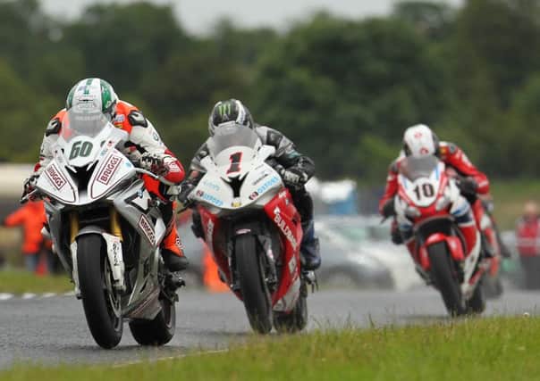 Peter Hickman leads Michael Dunlop and Conor Cummins in the Superbike class at the 2015 Ulster Grand Prix.