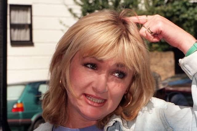 File photo dated 05/08/1998 of Caroline Aherne arriving home after she checked out of the Priory clinic