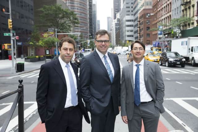 Alastair Hamilton, centre, pictured with Fadi Kaddoura, left, and Marshall Saffer of MIK Fund Solutions in New York