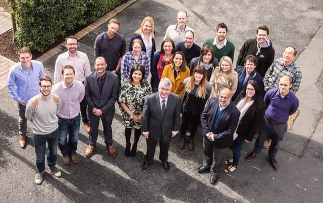 Current participants on the Invest NI Propel Programme are pictured with Niall Casey, director of skills and strategy