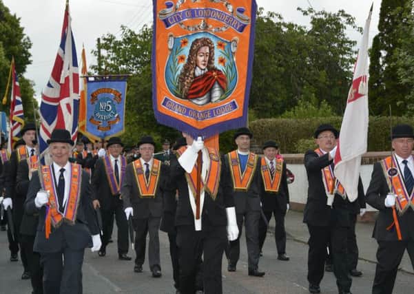 The City of Londonderry Grand Orange Lodge parading in Limavady.