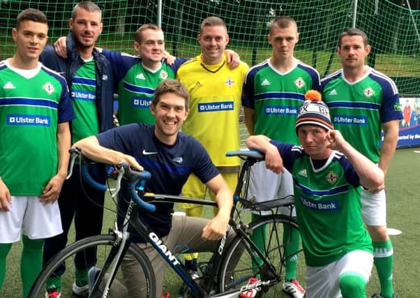 Dr Stephen Collins,27, from Coleraine in Co Londonderry, with the Street Soccer NI team, the doctor cycled the length of France to support the Northern Ireland football team and has raised just over Â£3,000 for a homeless charity. PRESS ASSOCIATION Photo. Picture date: Tuesday July 5, 2016. Mr Collins, covered around 2,100 miles during a 21-day Tour de GAWA (Green and White Army). He slogged through torrential downpours from Belfast to the Riviera via the Alps then returned across the historic and beautiful region of Provence to Paris.
See PA story ULSTER Cyclist . Photo credit should read: Michael McHugh/PA Wire