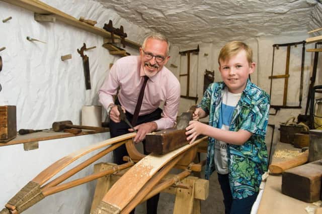Thomas Costella age 9 and Junior Explorer VIP for the new RACE Exhibition at Titanic Belfast with CEO Tim Husbands. Picture: Elaine Hill.