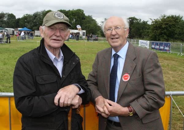 Antrim Show chairman Fred Duncan, right, is pictured with ninety-one-year-old Robbie Mulligan, Banbridge, who will judge the Holstein entry at this year's 110th annual show. Picture: McAuley Multimedia