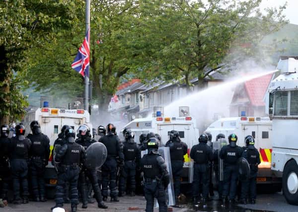 Picture - Kevin Scott / Presseye

Belfast - Northern Ireland - Monday 13th July 2015 -  Woodvale Parade 

Pictured is police riot officers dealing with violence at the Orange order parade as it reaches its stopping point on the Woodvale road in North Belfast, Northern Ireland. 


Picture by Kevin Scott  / Presseye.