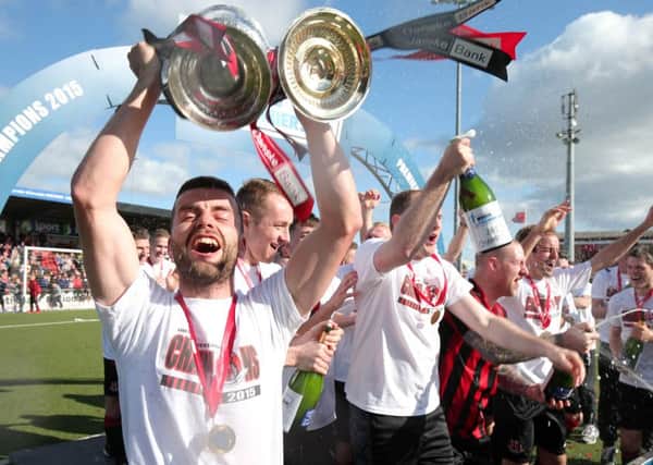 Crusaders will start the defence of their title against Ballymena United