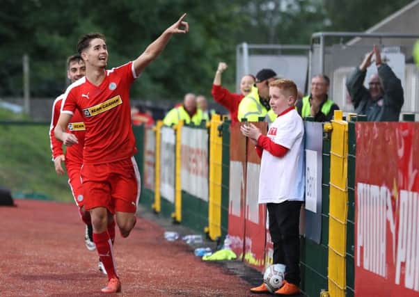 Cliftonvilles Jay Donnelly celebrates after scoring the second goal against Differdange 03