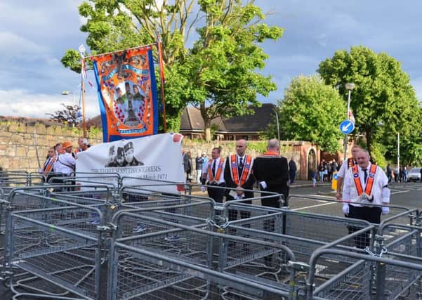Only a small number of members of Ballysillan lodge arrived at the barrier on the Woodvale Road. 
Picture By: Arthur Allison.
