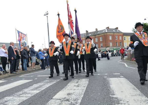 Orangemen near the Clifton Street start of the Belfast parade Colm Lenaghan/Pacemaker