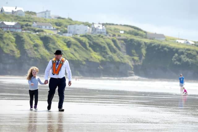 Neil Graham and daughter Nicole from Florencecourt at  the annual Rossnowlagh Orange parade in County Donegal