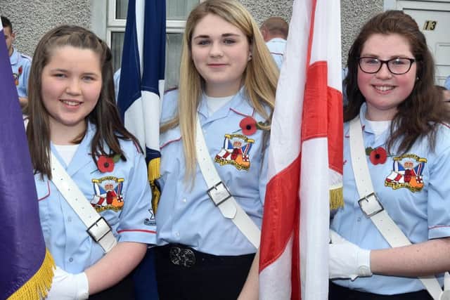 Flag Day...Hillhaven Flute Band members from left, Suzanne Dowey, Zara Hoey and Christine Robinson. INPT28-207.