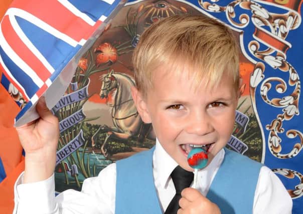 Roden Accordian Band member Daniel Graham, aged 5 had the 326th Anniversary, Battle of The Boyne, Flagship Twelfth celebrations in Kilkeel, 'well and truly licked'.  Â© Photo: Gary Gardiner.