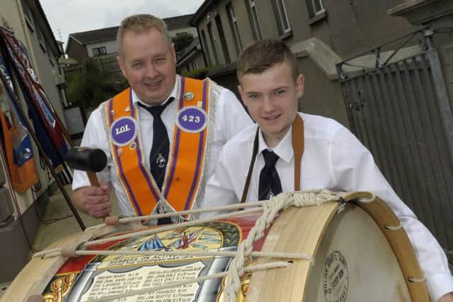 Twelfth Demonstration in Dromore Co Down : Bro Mark Gilliland and son Jack with Bible & crown Defenders new lambeg drum  Â©Paul Byrne Photography INNL-DROMORE 1