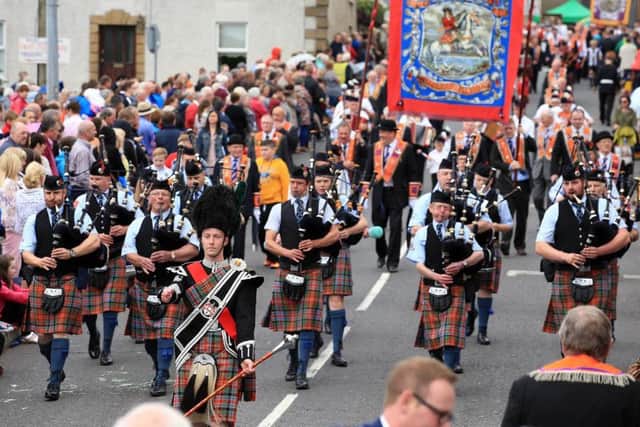 Killadeas Pipe Band making their way down Maguiresbridge main street on the Twelfth.picture by John McVitty, Enniskillen, Co.Fermanagh, N.Ireland-07771987378