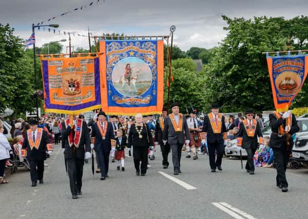 The colour party at the head of the parade through Coagh