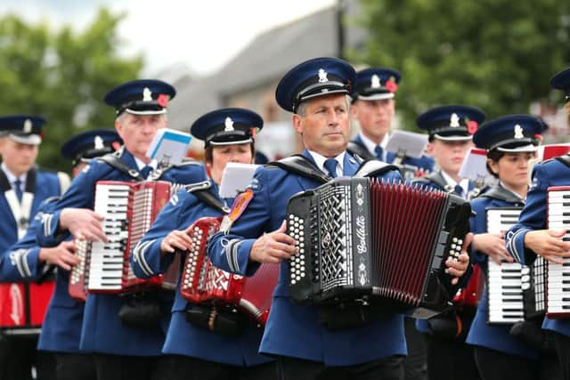 Members of Milltown accordion band on parade