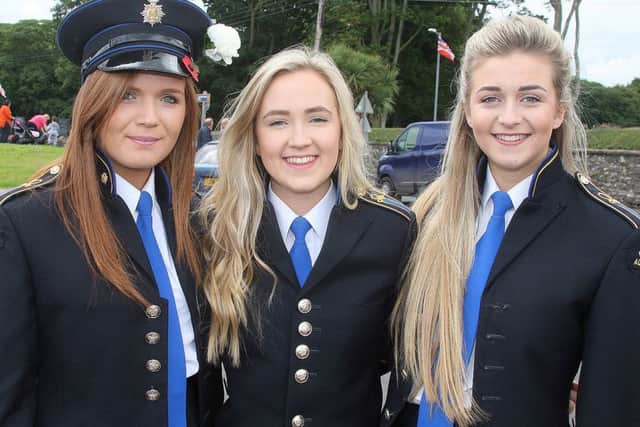 Ballygelly Accordion Band members Lauren and Rebecca Connor, and Alyson Irwin