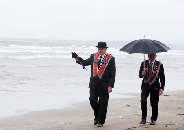 Two attendees at the annual Rossnowlagh Twelfth Orange Order parade in Rossnowlagh, Co Donegal, 2015