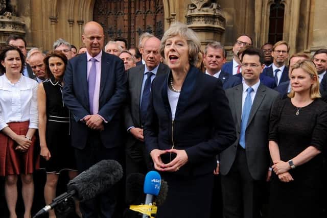 Theresa May outside the Houses of Parliament in Westminster, after she secured her place as the UK's second female prime minister. Photo: Dominic Lipinski/PA Wire