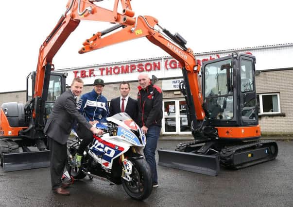L-R: Alan Espie, Director at TBF Thompson, Ian Hutchinson, Seamus Doherty, Director at TBF Thompson and Noel Johnston, Clerk of the Course at the MCE Ulster Grand Prix