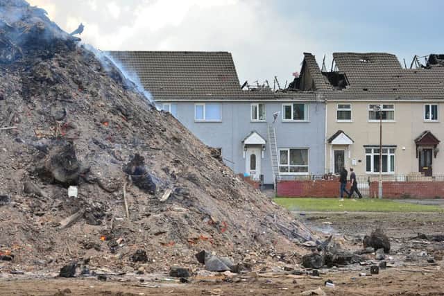 Terraced houses gutted in fire after the bonfire off the Shankill Road in Belfast