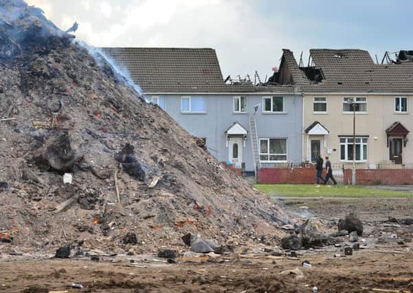 Shankill bonfire: Belfast terraced houses gutted in fire