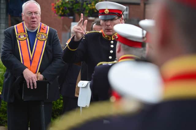 Thousands of Orange Order members are taking part in parades across Northern Ireland