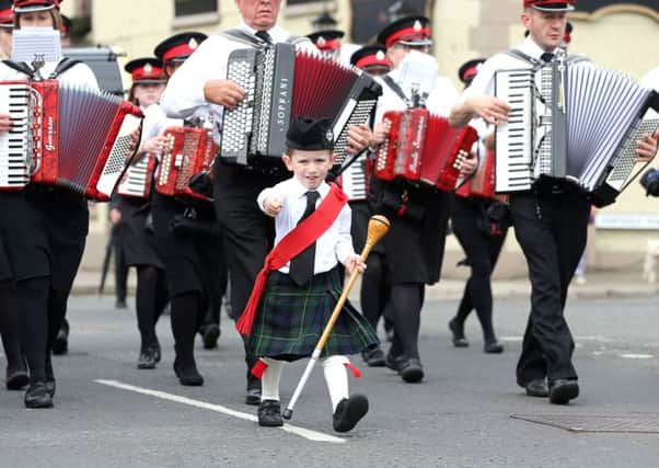 PACEMAKER, BELFAST, 12/7/2016:  A young bandsman leads the way during Portglenone's 12th of July celebrations.
PICTURE BY STEPHEN DAVISON