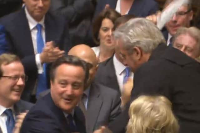 Prime Minister David Cameron shakes hands with Commons Speaker John Bercow as he leaves after finishing his last last Prime Minister's Questions in the House of Commons, London