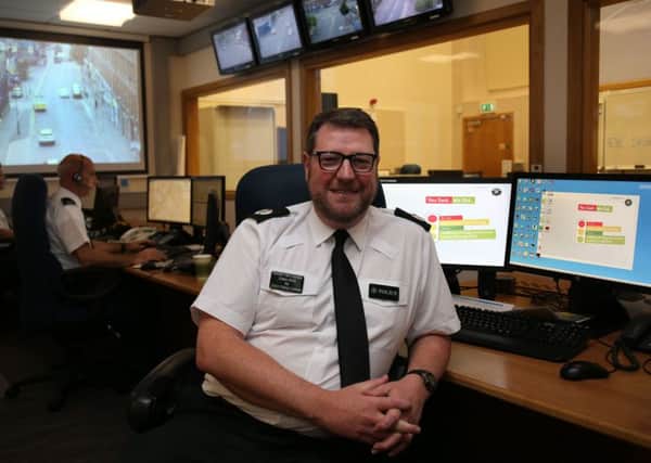 ACC Stephen Martin of the PSNI in the services Gold Control room in Belfast, who has described the major security operation around the traditional Twelfth of July loyal order parades in Northern Ireland as the most successful in years
