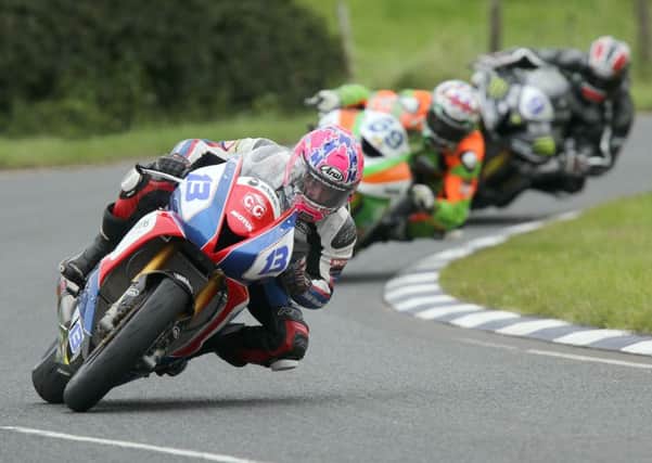 Lee Johnston leads Glenn Irwin and Ian Hutchinson at Quarry Bends during the second Supersport race at the Ulster Grand Prix