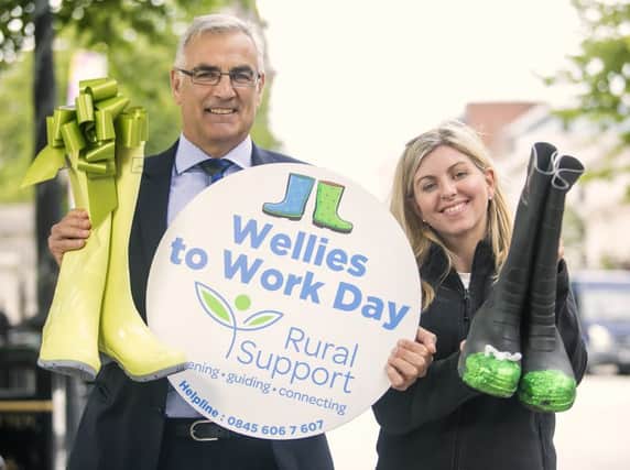 Simple Power Chief Executive, Philip Rainey, presented Clare Forster from Downpatrick (representing her Mash Direct co-worker Leah Deehan) with the winning prize of designer wellingtons for her stand-out effort and creativity in Rural Supports Wellies to Work Day.