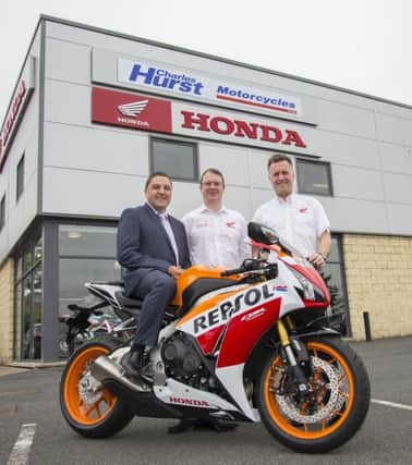 David White, general manager for Charles Hurst Motorcycles, left, with sales manager David Allen and Graham Foster-Vigors of Honda UK Motorcycles