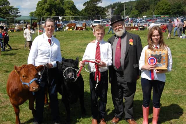 Dexter cattle breeders had a great day out at the Castlewellan Show (from left) Heather Briggs, Ballymena; Matthew Bloomer, Dungannon; Andrew Sheppy, Somerset (judge of Dexter classes) and Alanna Bloomer, Dungannon