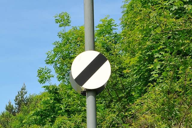National speed limit sign. The national limit on single carriageway roads is 60 mph