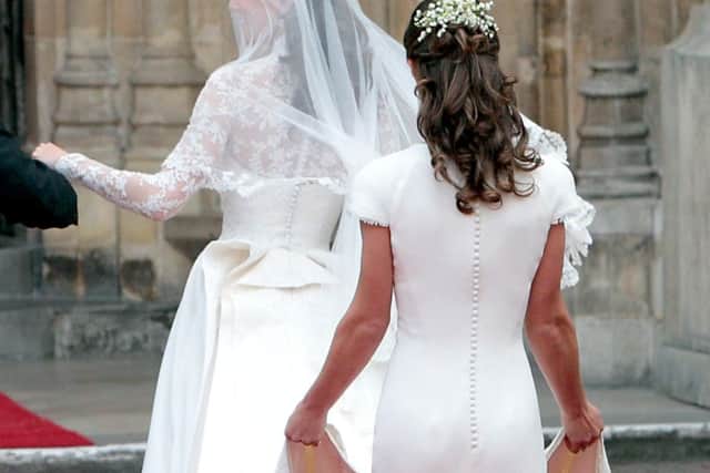 Pippa Middleton (right) at the wedding of the Duke and Duchess of Cambridge in 2011. Photo: Lewis Whyld/PA Wire