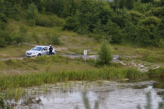 The scene of a major collision at the Springbank pond in the Colin Glen Forest Park