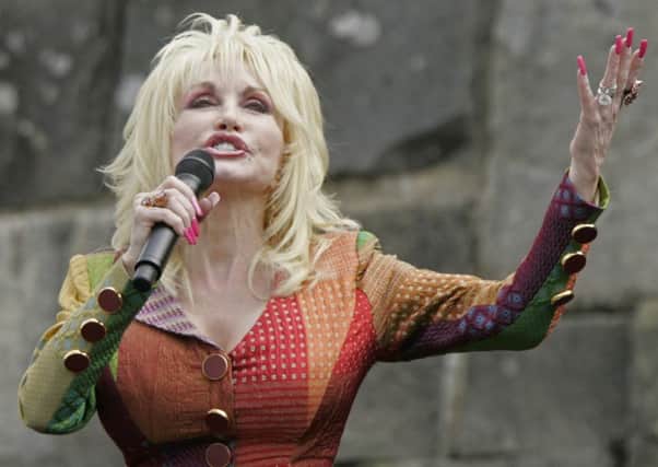 Dolly Parton performing during the 75th Anniversary Rededication Event at the Rockefeller Memorial at Newfound Gap in the Great Smoky Mountains National Park