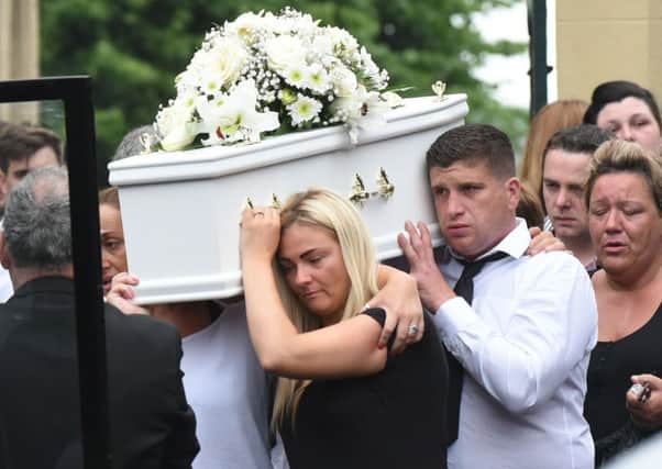 Friends and family led Ronan McGavigans funeral cortege