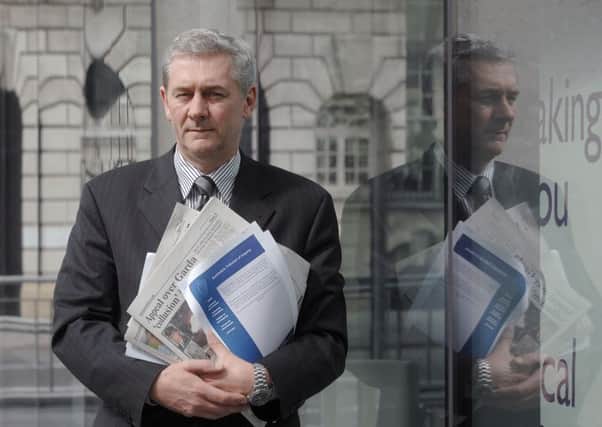 Solicitor  John McBurney who co-authored  a new report on tackling paramilitary crime. Pic: Colm Lenaghan/Pacemaker