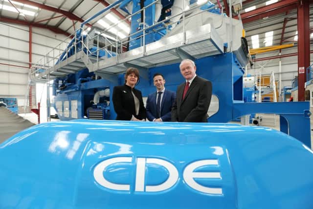 First Minister Arlene Foster and Deputy First Minister Martin McGuinness pictured earlier this year with Brendan McGurgan, managing director of CDE Global, a firm with plans to create 110 jobs in the next five years