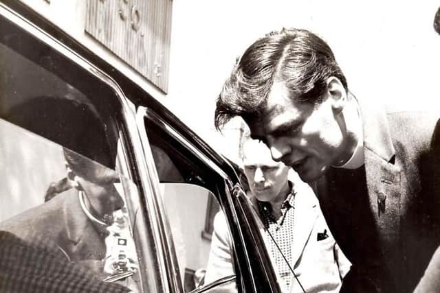 This photo, published in the News Letter on 21 July 1966, shows the Rev Ivan Foster talking to the police in a car outside Ravenhill Free Presbyterian Church