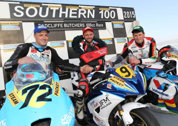 Seamus Elliott (centre) celebrates winning the 600cc race during last year's Southern 100 with runner-up Russ Mountford (left) and Dan Kneen.