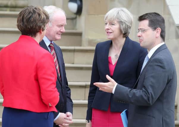 Prime Minister Theresa May with First Minister Arlene Foster, Deputy First Minister Martin McGuinness and James Brokenshire, Secretary of State for Northern Ireland, at Stormont Castle, Belfast