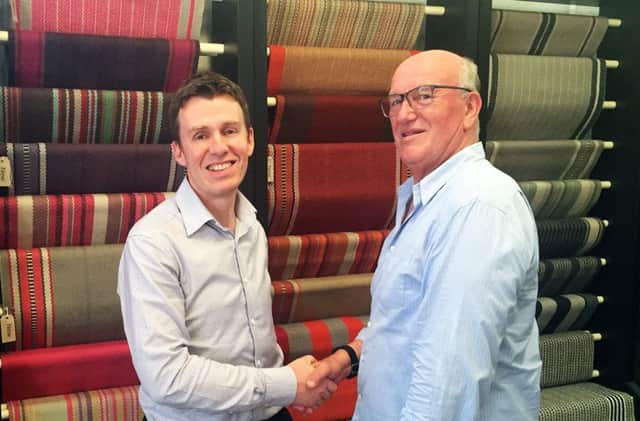 David Acheson, head of strategic operations with designer Roger Oates