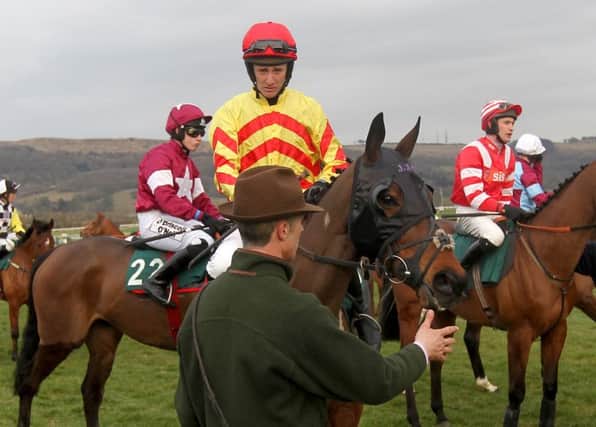 JT McNamara on Galaxy Rock before the Fulke Walwyn Kim Muir Challenge Cup Handicap Steeple Chase during the 2013 Cheltenham Festival. The renowned amateur jockey has died aged 41. Photo: David Davies/PA Wire