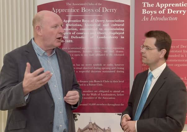 Secretary of State James Brokenshire (right) with Billy Moore from the Apprentice Boys of Derry Centre during a visit to Londonderry